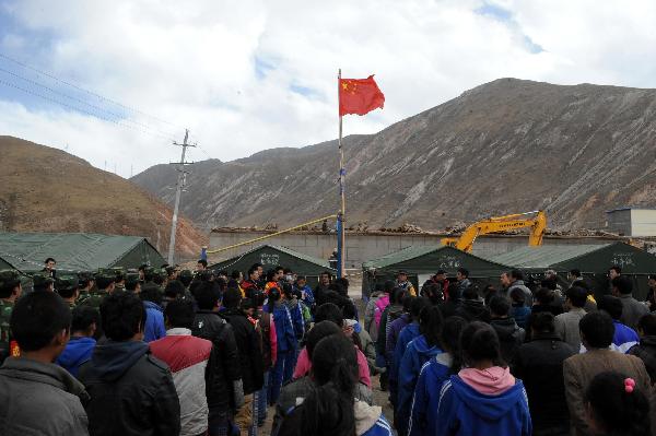 A ceremony is held to resume class at the No. 1 High School for Nationalities of the quake-hit Tibetan Autonomous Prefecture of Yushu, northwest China's Qinghai Province, April 18, 2010. The school resumed its classes on Sunday. A 7.1-magnitude quake struck Yushu Wednesday morning.