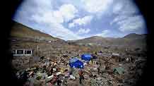 Photo taken on April 19, 2010 shows a view of the quake-devastated Zhaxi Datong Village, in Gyegu Town, Yushu County, northwest China's Qinghai Province. Zhaxi Datong Village is the worst-hit area during the April 14 quake in Qinghai. It has been mostly razed to the ground and 120 of the total about 670 villagers here lost their lives.