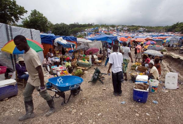 Photo taken on April 20, 2010 shows a makeshift refuge center in Port-au Prince, capital of Haiti. Hundreds of thousands of people in Haiti still live in desperate condition three months after the Jan. 12 earthquake.