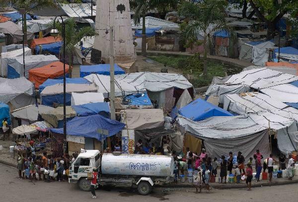 Photo taken on April 20, 2010 shows a makeshift refuge center in Port-au Prince, capital of Haiti. Hundreds of thousands of people in Haiti still live in desperate condition three months after the Jan. 12 earthquake. 