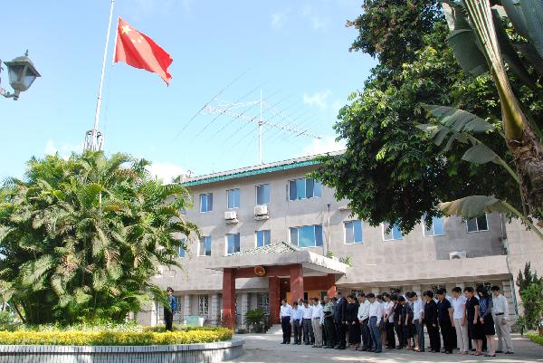 Chinese national flag flies at half-mast to mourn for the victims of Yushu earthquake at Chinese Embassy in Rangoon, Myanmar, April 21, 2010.