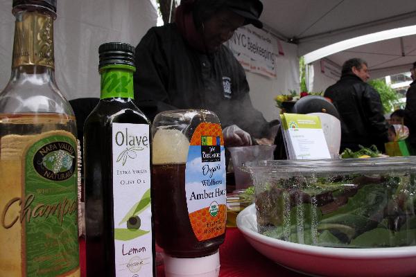 Organic olive oil, honey and vegetable are displayed on Union Square in New York, the United States, April 25, 2010. 