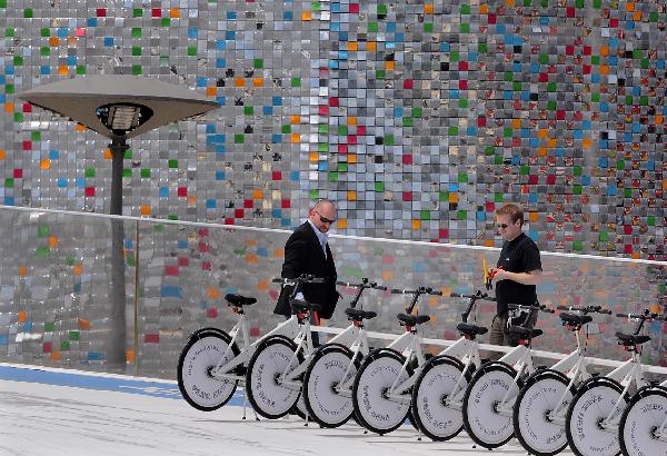 Employees sort the bicycles in the Denmark Pavilion in the World Expo Park in Shanghai, east China, April 25, 2010. 