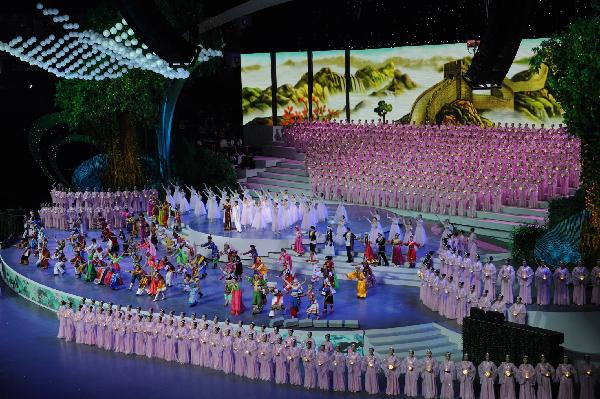 Song Zuying and Jackie Chan sing &apos;Harmonious Gathering&apos; during the opening ceremony of the 2010 Shanghai World Expo at the Expo Cultural Center in Shanghai, east China, April 30, 2010.