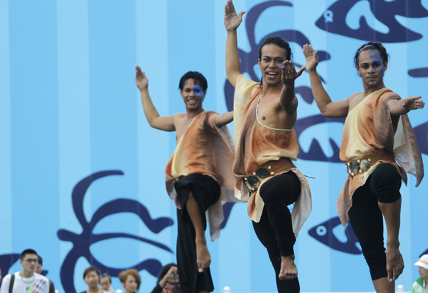 Actors from New Zealand perform dance in the World Expo Park in Shanghai, east China, on May 5, 2010.