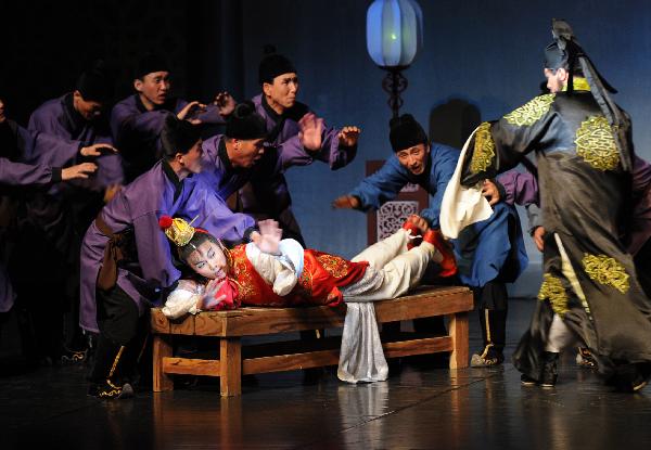 Actors from the Phibada Opera Troupe of the Democratic People's Republic of Korea (DPRK) perform 'A Dream of Red Mansions' in Beijing, capital of China, May 6, 2010.