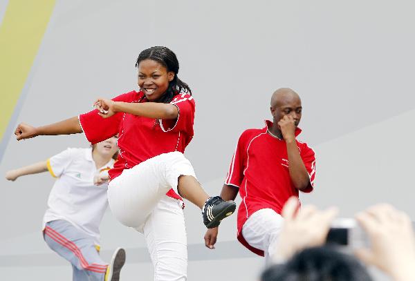 Actors perform at the opening ceremony of the South Africa Pavilion in Shanghai Expo, Shanghai, east China, on May 6, 2010.