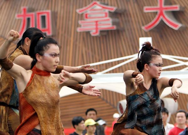 Actors perform at Canada Pavilion during its press open day in Shanghai Expo, Shanghai, east China, on May 6, 2010.