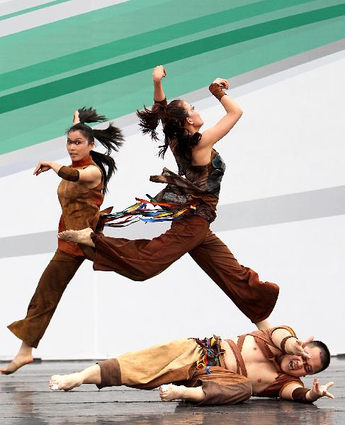 Actors perform at Canada Pavilion during its press open day in Shanghai Expo, Shanghai, east China, on May 6, 2010.