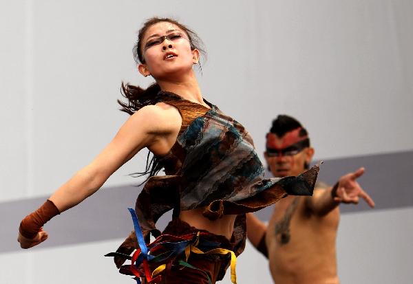 Actors perform at Canada Pavilion during its press open day in Shanghai Expo, Shanghai, east China, on May 6, 2010.