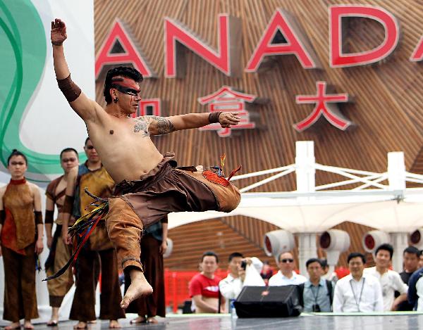 Actors perform at Canada Pavilion during its press open day in Shanghai Expo, Shanghai, east China, on May 6, 2010.