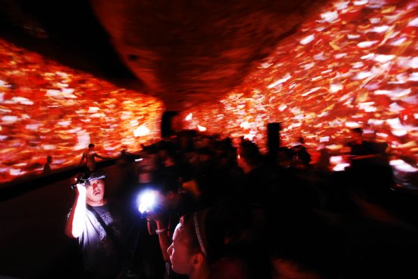 People visit Spanish Pavilion at the 2010 World Expo in Shanghai, east China, on May 5, 2010. The multimedia and lumia show at the 2010 World Expo attracted so many tourists. 