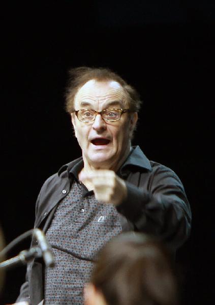 Maestro Charles Dutoit conducts the Philadelphia Orchestra during a rehearsal at the Expo Cultural Center in Shanghai, east China, May 7, 2010. The Philadelphia Orchestra will stage a performance at the Expo Cultural Center Friday night.