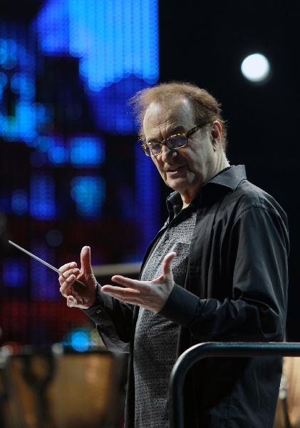 Maestro Charles Dutoit conducts the Philadelphia Orchestra during a rehearsal at the Expo Cultural Center in Shanghai, east China, May 7, 2010. The Philadelphia Orchestra will stage a performance at the Expo Cultural Center Friday night. 