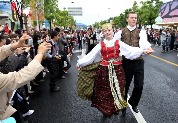 Performers dance during the European Day Parade at the 2010 World Expo site in Shanghai May 9, 2010. 