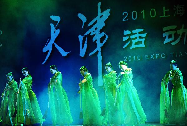 Tianjin actresses perform during the 2010 Expo Tianjin Week at the 2010 World Expo in Shanghai, east China, May 9, 2010. 