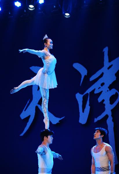 Tianjin actresses perform during the 2010 Expo Tianjin Week at the 2010 World Expo in Shanghai, east China, May 9, 2010.