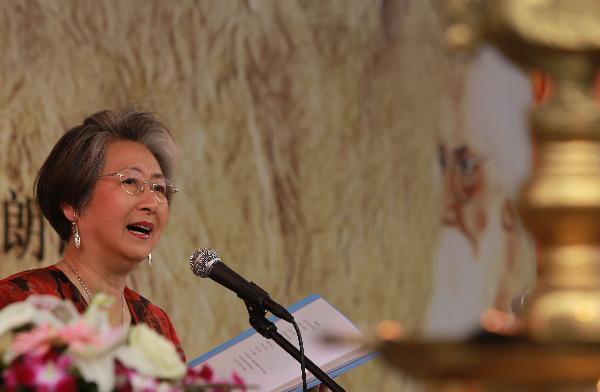 Artist Cao Lei reads a poetry of Indian Nobel laureate poet Rabindranath Tagore in India Pavilion at the World Expo park in Shanghai, east China, May 10, 2010.