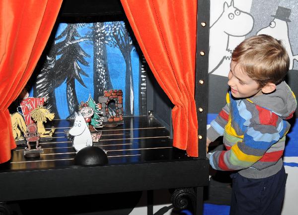 A child plays at a museum featured cartoon figure Muumi in Helsinki, Finland, May 7, 2010.