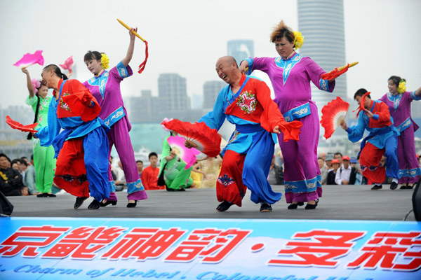 Farmer dancers from Changli County, Qinhuangdao of North China's Hebei Province, perform at the Expo Garden on Saturday as part of the Hebei Week activities, May 15, 2010. The dance has been placed on the national non-material heritage list. 