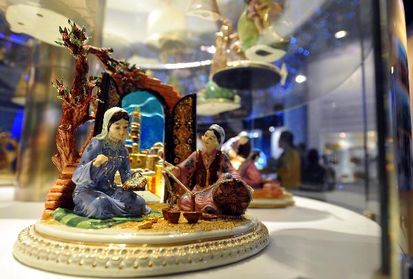 Pottery statues on display are seen at the Uzbekistan Pavilion in the World Expo park in Shanghai, east China, May 10, 2010.