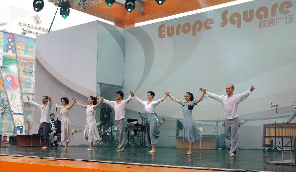 Dancers from a Spain's Galicia dancing troupe perform during the Galicia week event held by the Spain Pavilion at the 2010 World Expo in Shanghai, east China, May 18, 2010. 