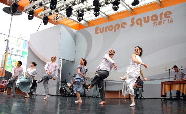 Dancers from a Spain's Galicia dancing troupe perform during the Galicia week event held by the Spain Pavilion at the 2010 World Expo in Shanghai, east China, May 18, 2010. 