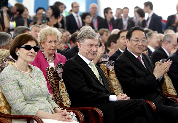 German President Horst Koehler (C front), and Yu Zhengsheng (R front), member of the Political Bureau of the Communist Party of China (CPC) Central Committee and secretary of the CPC Shanghai Municipal Committee, attend the celebration marking the National Pavilion Day for Germany at the World Expo park in Shanghai, May 19, 2010.