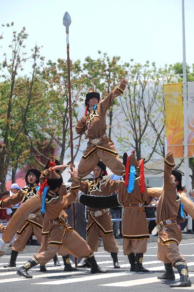A group of archers perform during a parade at the World Expo Park in Shanghai, east China, May 24, 2010.