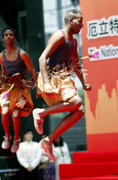 Actors from Eritrea perform during a ceremony marking the National Pavilion Day of Eritrea, at the World Expo in Shanghai, May 25, 2010. 