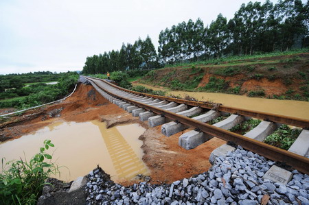 Railway track destroyed by the flood in Laibin City, south China's Guangxi Zhuang Autonomous Region, June 1, 2010.