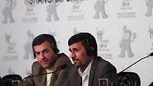 Iranian President Mahmoud Ahmadinejad (R) attends a news conference in Shanghai, east China, June 11, 2010.