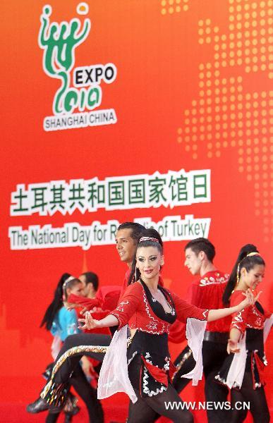 Turkish performers dance at the World Expo Park in Shanghai, east China, June 20, 2010, the National Pavilion Day of Turkey. 