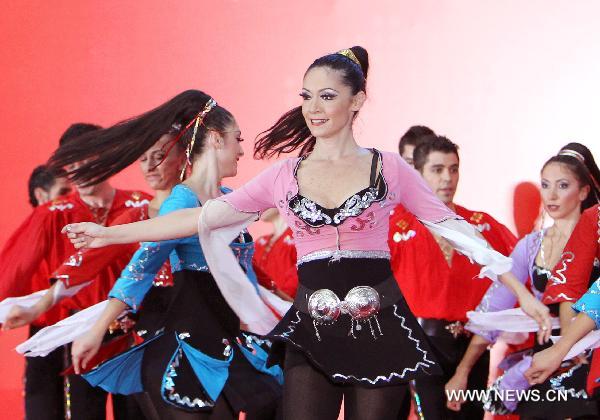 Turkish performers dance at the World Expo Park in Shanghai, east China, June 20, 2010, the National Pavilion Day of Turkey. 