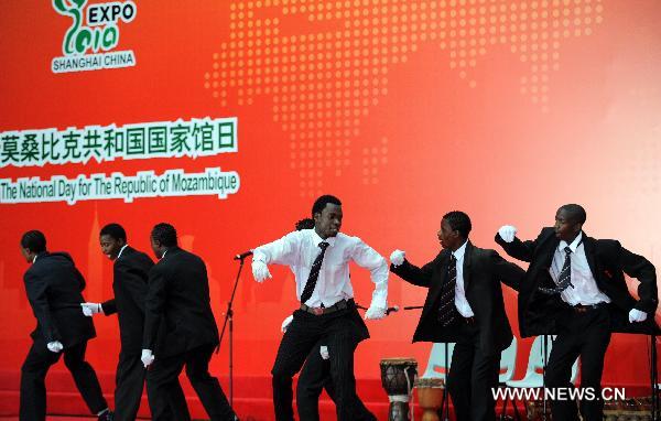 Actors from Mozambique perform tradional dance during the national pavilion day of the Mozambique pavilion at the World Expo in Shanghai, east China, on June 25, 2010. 