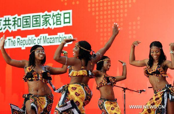 Actors from Mozambique perform tradional dance during the national pavilion day of the Mozambique pavilion at the World Expo in Shanghai, east China, on June 25, 2010. 