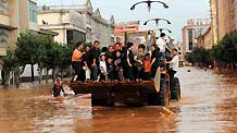 Some local residents are evacuated in Malong County of southwest China's Yunnan Province June 26, 2010.