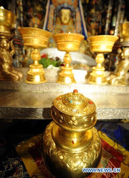 The golden urn for the reincarnation of the 5th Living Buddha Dezhub is seen in the Jokhang Temple in Lhasa, capital of southwest China&apos;s Tibet Autonomous Region, on July 4, 2010. 