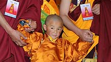 A candidate with the secular name Losang Doje is selected as the reincarnation of the 5th Living Buddha Dezhub in Lhasa, capital of southwest China's Tibet Autonomous Region, on July 4, 2010.