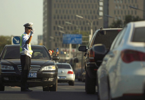 Record high 40.3 C scorches Beijing