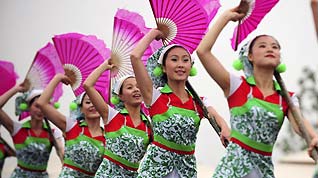 People from Hakka ethnic group of Jiangxi Province perform at Shanghai Expo, July 5, 2010.