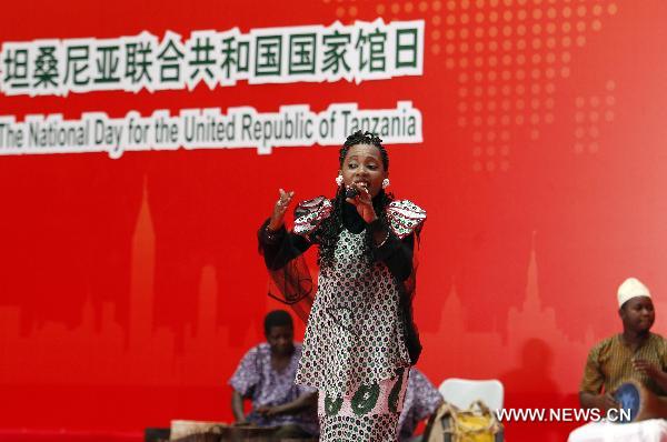 A singer performs during a ceremony marking the National Pavilion Day of Tanzania at the 2010 World Expo in Shanghai, east China, July 7, 2010.