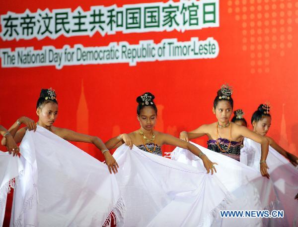 Dancers from Timor-Leste perform during a ceremony marking the National Pavilion Day for the Democratic Republic of Timor-Leste at the 2010 World Expo in Shanghai, east China, July 13, 2010. 