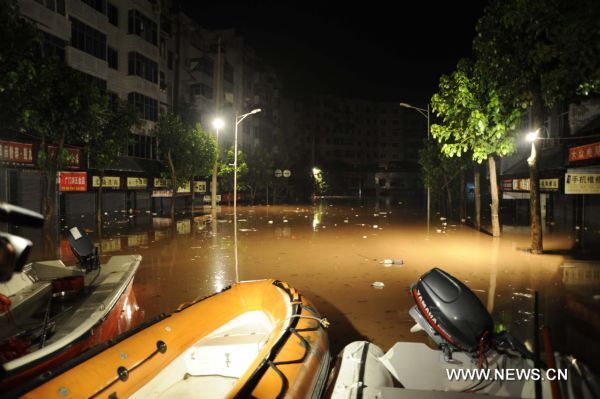  Photo taken on July 19,2010 shows a waterlogged street in Guang'an City, southwest China's Sichuan Province.