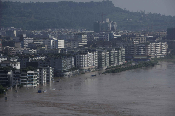 An aerial photo taken on July 19, 2010 shows the flood-stricken Guang'an, Southwest China's Sichuan province. The most severe flood since 1847 hit the city, with more than 250,000 people affected. 