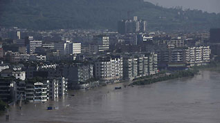 An aerial photo taken on July 19, 2010 shows the flood-stricken Guang'an, Southwest China's Sichuan province. The most severe flood since 1847 hit the city, with more than 250,000 people affected.