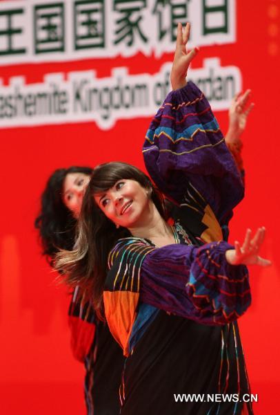 Jordanian actors perform during a ceremony to mark the National Pavilion Day for the Hashemite Kingdom of Jordan at the 2010 World Expo in Shanghai, east China, July 25, 2010. 