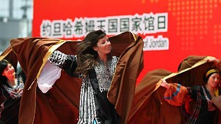 Jordanian actors perform during a ceremony to mark the National Pavilion Day for the Hashemite Kingdom of Jordan at the 2010 World Expo in Shanghai, east China, July 25, 2010.