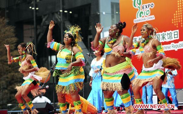 Gabonese actors perform at the ceremony celebrating the National Pavilion Day for the Gabonese Republic, in the 2010 World Expo in Shanghai, east China, July 30, 2010. 