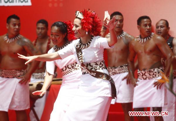 Dancers perform during a ceremony to celebrate the National Pavilion Day for the Independent State of Samoa at the 2010 World Expo in Shanghai, east China, on Aug. 1, 2010.